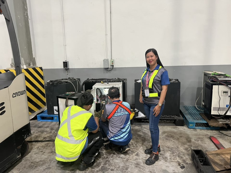 J.A.S team servicing battery chargers on site